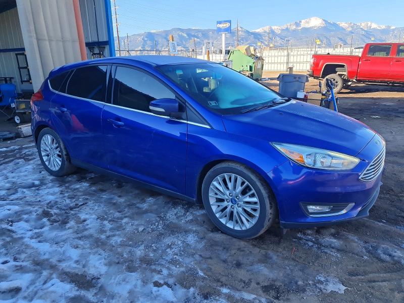 Photo 4 from auction – 2015 FORD FOCUS with VIN 1FADP3N27FL210424