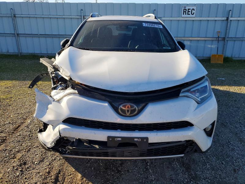 Photo 5 from auction – 2018 TOYOTA RAV4 with VIN 2T3NFREV7JW449072