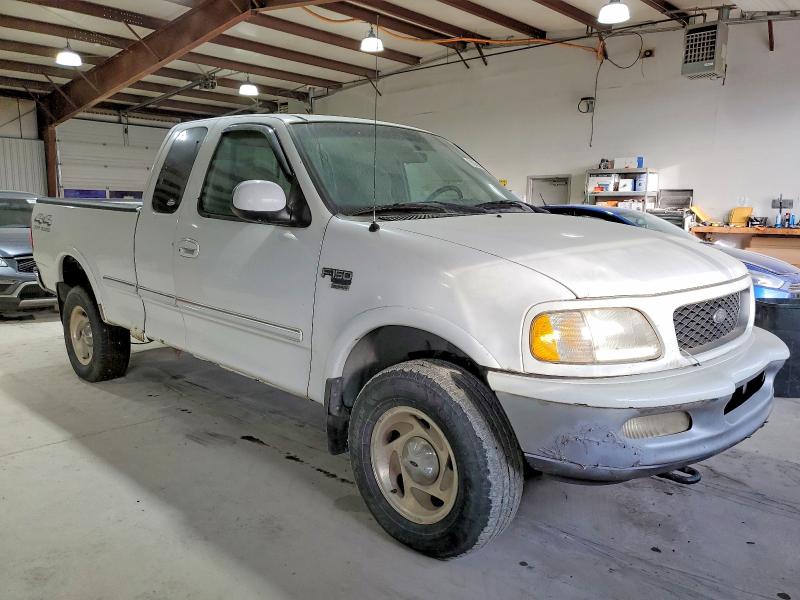 Photo 4 from auction – 1998 FORD F150 with VIN 1FTRX18L3WNC39660