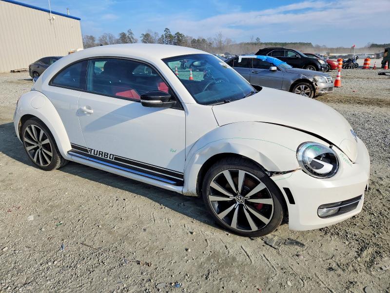 Photo 4 from auction – 2012 VOLKSWAGEN BEETLE TUR with VIN 3VWVA7AT4CM648878