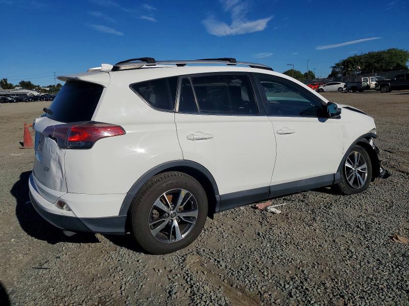 Photo 3 from auction – 2018 TOYOTA RAV4 with VIN 2T3WFREV0JW478689