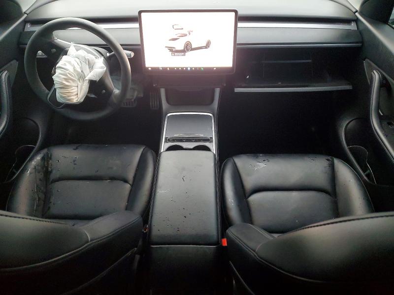 Photo 8 from auction – 2022 TESLA MODEL Y with VIN 7SAYGDEF2NF387620