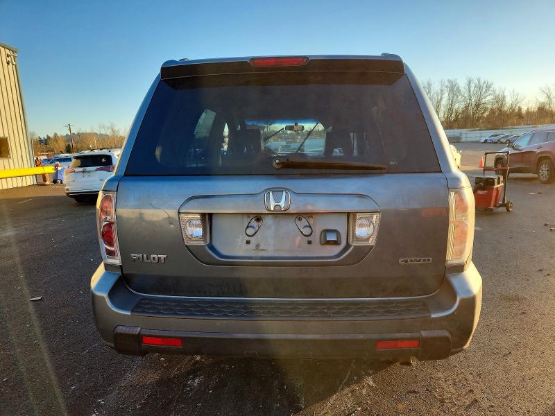 Photo 6 from auction – 2006 HONDA PILOT EX with VIN 2HKYF18776H526971