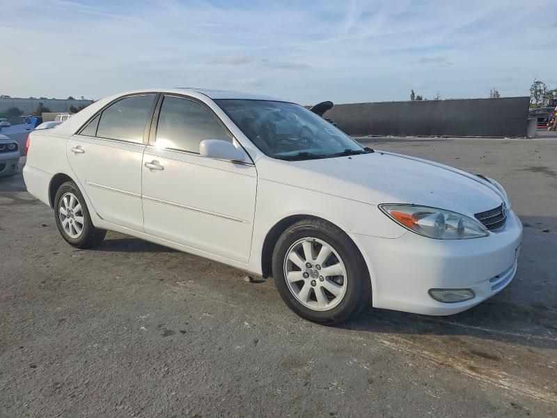 Photo 4 from auction – 2003 TOYOTA CAMRY LE with VIN 4T1BF32K93U050556