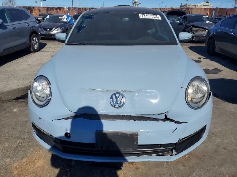 Photo 5 from auction – 2013 VOLKSWAGEN BEETLE with VIN 3VWJP7AT0DM620798