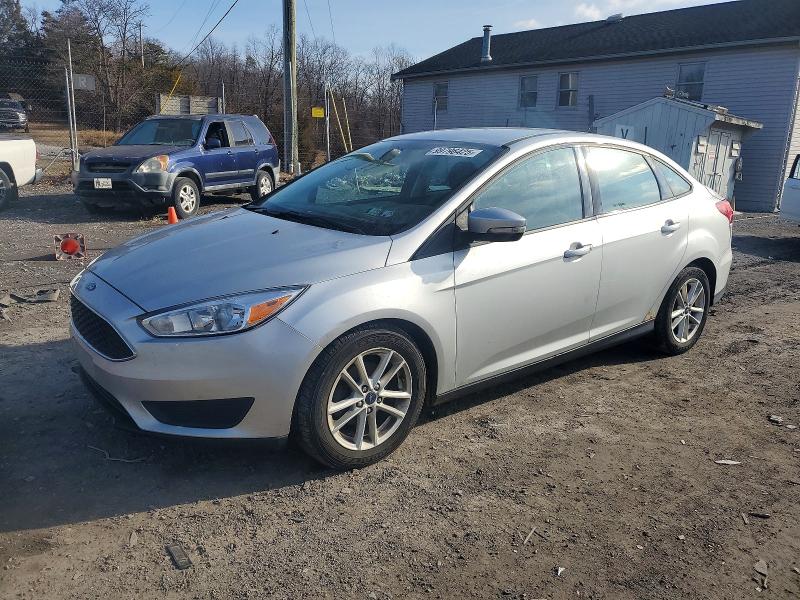 FORD FOCUS SE 2016 with VIN 1FADP3F26GL228297 - Photo from auction