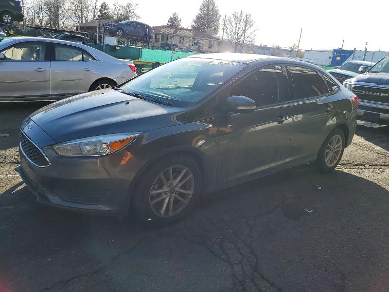 FORD FOCUS 2017 with VIN 1FADP3F24HL286524 - Photo from auction