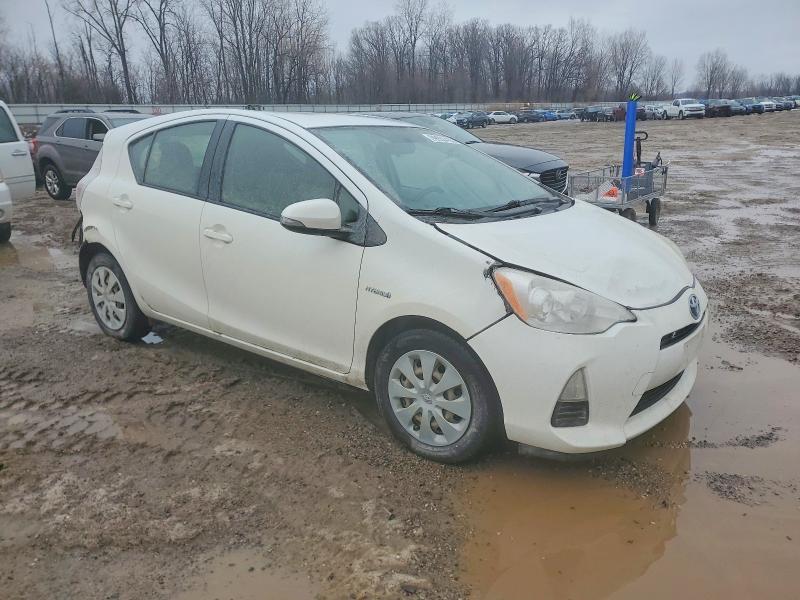 Photo 4 from auction – 2013 TOYOTA PRIUS C with VIN JTDKDTB30D1528563