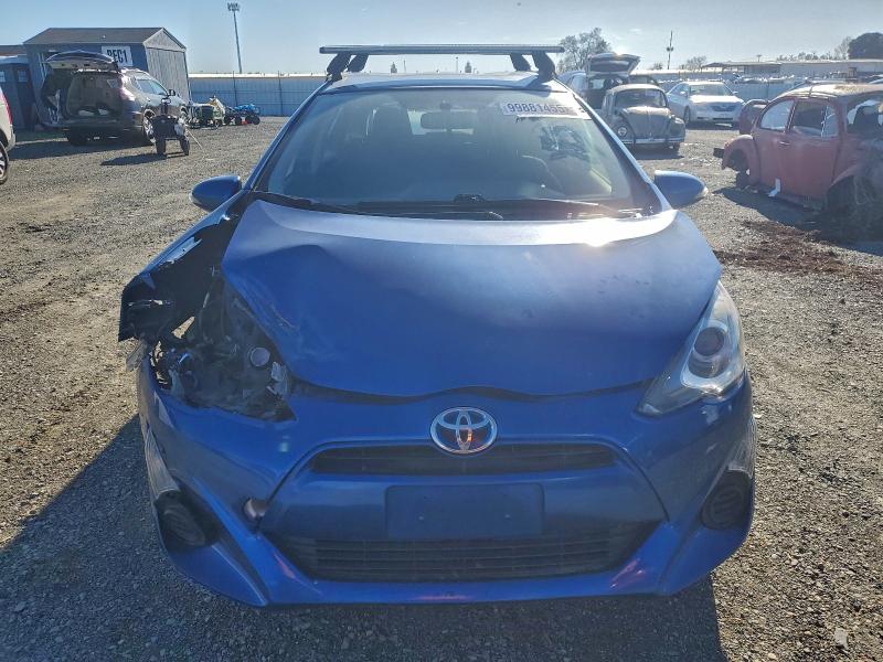 Photo 5 from auction – 2015 TOYOTA PRIUS C with VIN JTDKDTB30F1109874