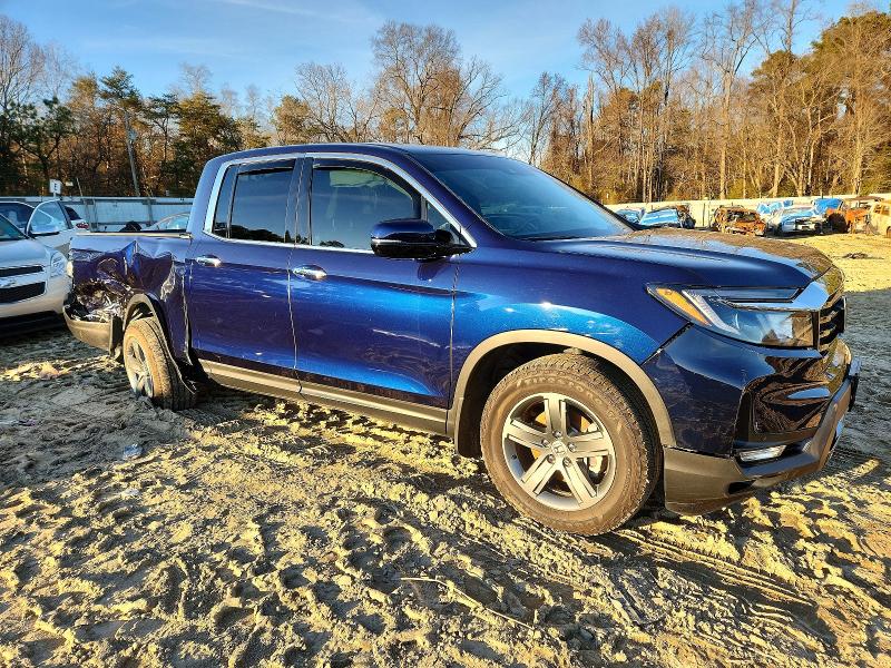 Photo 4 from auction – 2023 HONDA RIDGELINE with VIN 5FPYK3F76PB043389