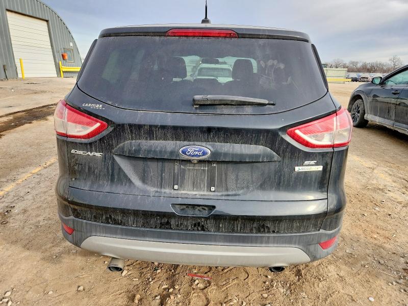 Photo 6 from auction – 2014 FORD ESCAPE with VIN 1FMCU0GX4EUE37774