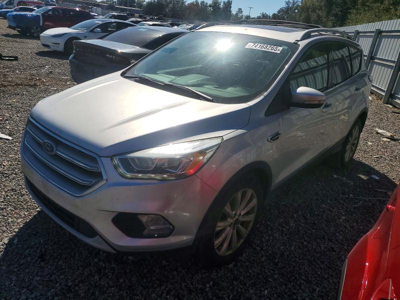 FORD ESCAPE 2017 with VIN 1FMCU0J98HUB36620 - Photo from auction