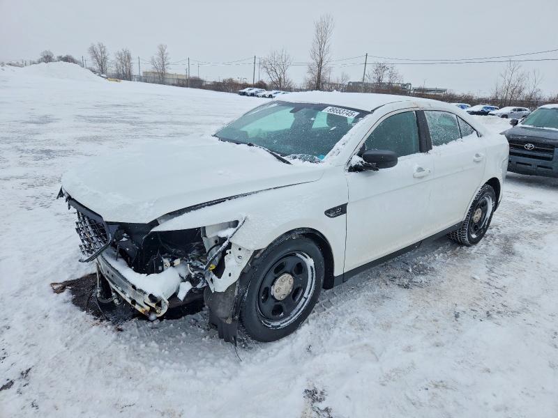 FORD TAURUS POL 2015 with VIN 1FAHP2MKXFG111098 - Photo from auction