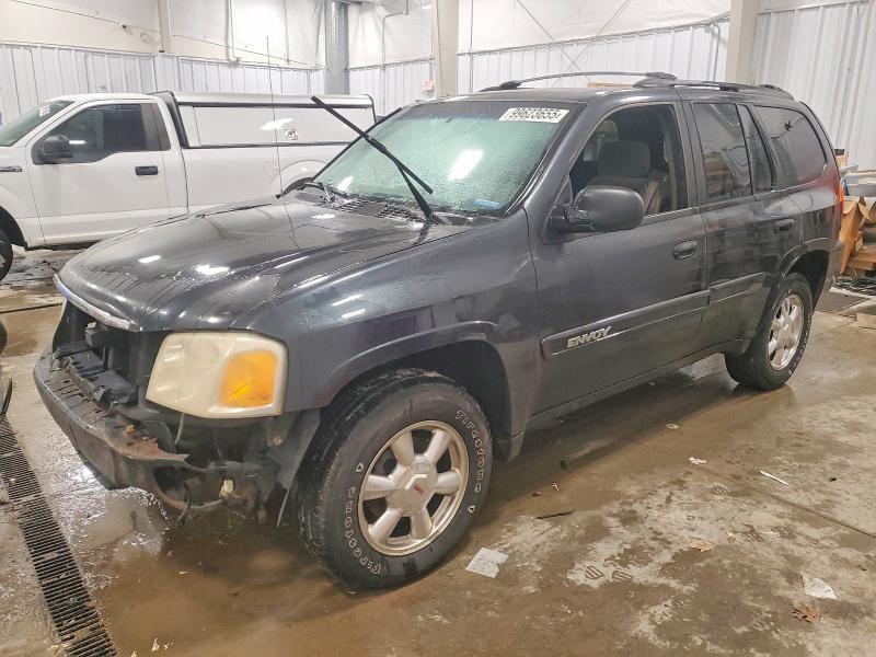 GMC ENVOY 2003 with VIN 1GKDT13S332164237 - Photo from auction