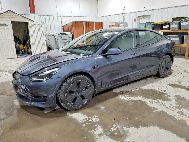 TESLA MODEL 3 2023 with VIN 5YJ3E1EB5PF634236 - Photo from auction
