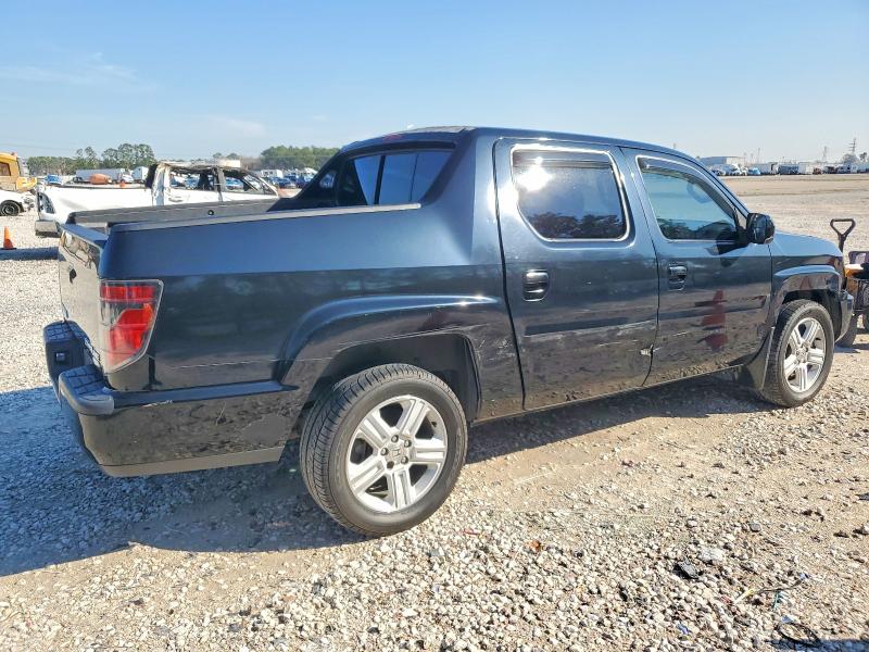 Photo 3 from auction – 2013 HONDA RIDGELINE with VIN 5FPYK1F56DB005675
