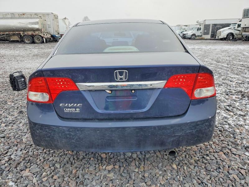 Photo 6 from auction – 2010 HONDA CIVIC LX with VIN 19XFA1F5XAE029756
