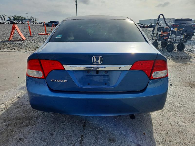 Photo 6 from auction – 2011 HONDA CIVIC LX with VIN 19XFA1F54BE028264