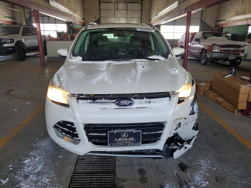 Photo 5 from auction – 2014 FORD ESCAPE with VIN 1FMCU9J90EUD92718