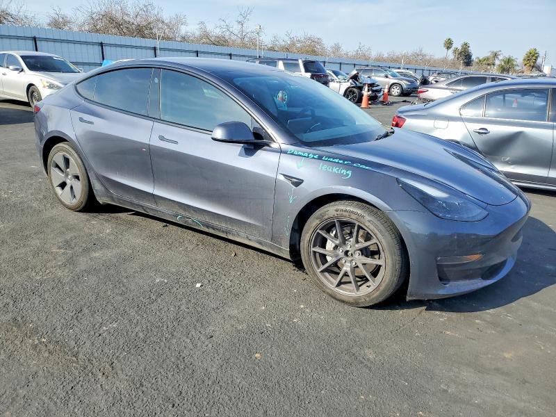 Photo 4 from auction – 2023 TESLA MODEL 3 with VIN 5YJ3E1EB9PF618704