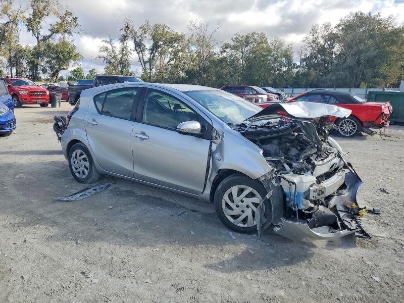 Photo 4 from auction – 2015 TOYOTA PRIUS C with VIN JTDKDTB3XF1586067
