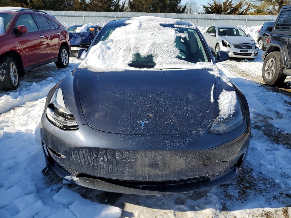 Photo 5 from auction – 2022 TESLA MODEL 3 with VIN 5YJ3E1EB4NF337147