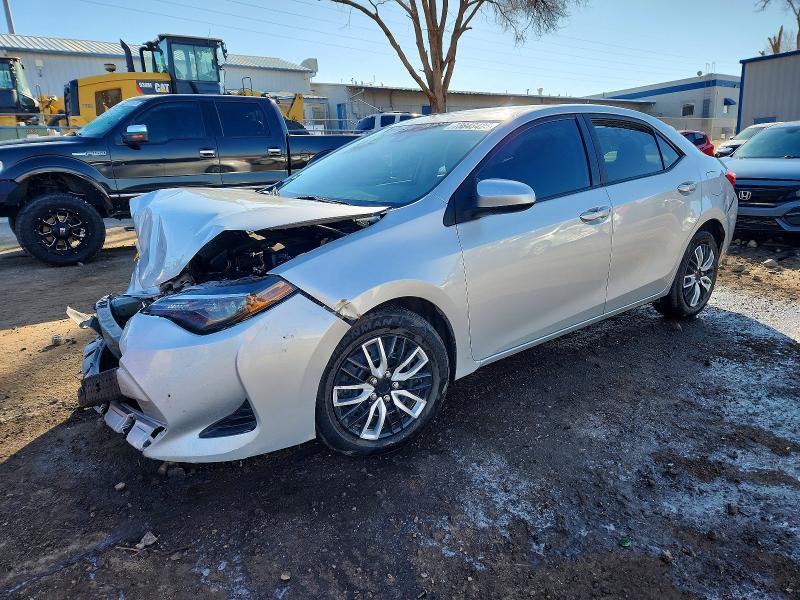 TOYOTA COROLLA L 2019 with VIN 5YFBURHE2KP858712 - Photo from auction