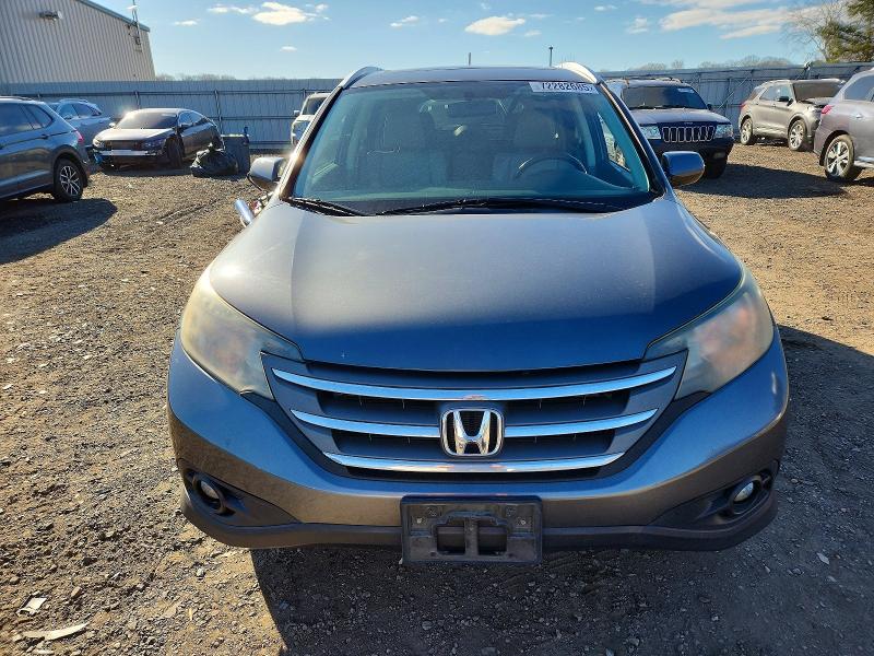 Photo 5 from auction – 2013 HONDA CR-V with VIN 2HKRM3H77DH501524