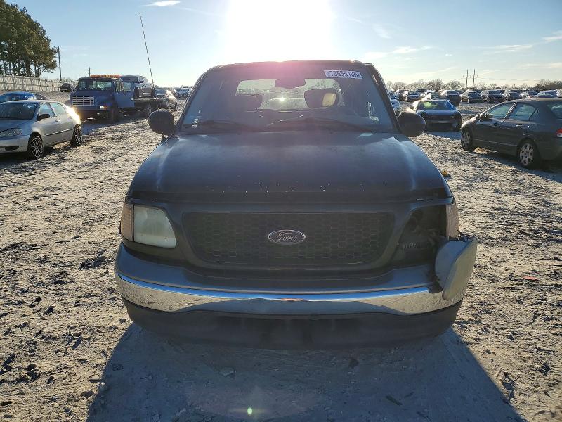 Photo 5 from auction – 2001 FORD F150 SUPER with VIN 1FTRW07L31KB66301