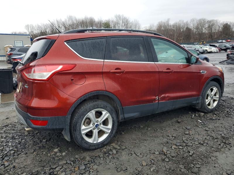 Photo 3 from auction – 2016 FORD ESCAPE SE with VIN 1FMCU9GX4GUB80879