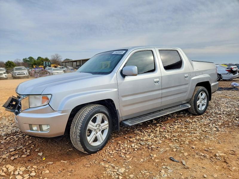 HONDA RIDGELINE 2011 with VIN 5FPYK1F50BB008052 - Photo from auction