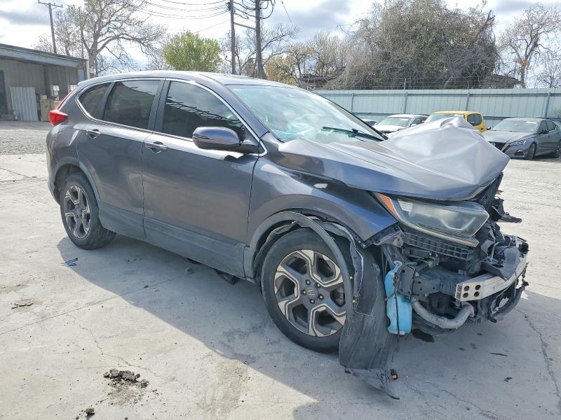 Photo 4 from auction – 2019 HONDA CR-V with VIN 5J6RW1H80KA014848