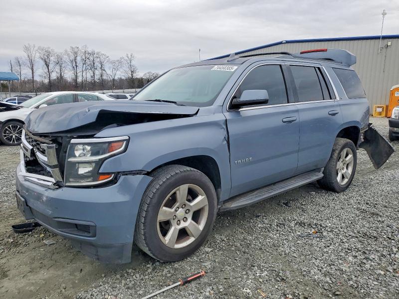 CHEVROLET TAHOE 2015 with VIN 1GNSCBKC3FR716101 - Photo from auction
