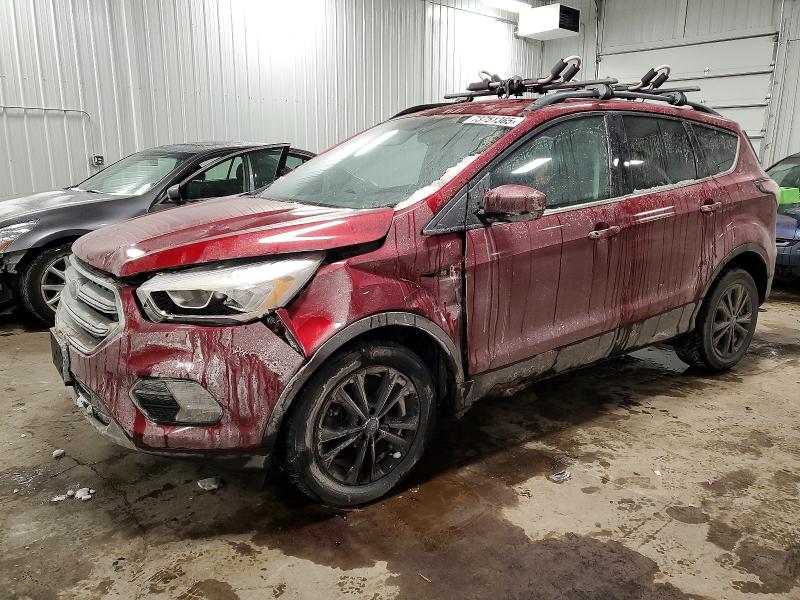 FORD ESCAPE 2018 with VIN 1FMCU9HDXJUA97775 - Photo from auction