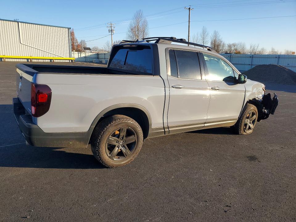 Photo 3 from auction – 2023 HONDA RIDGELINE with VIN 5FPYK3F83PB053936