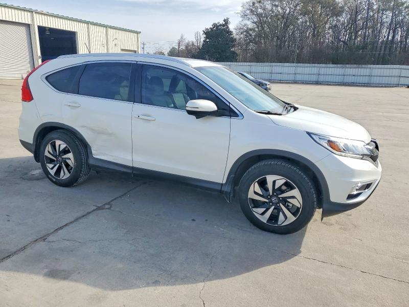 Photo 4 from auction – 2016 HONDA CR-V TOURI with VIN 5J6RM3H90GL019053