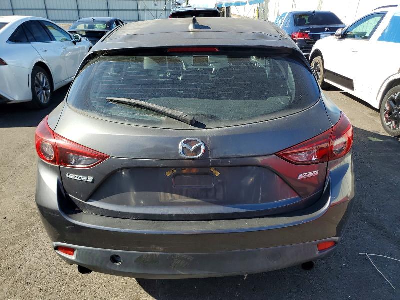 Photo 6 from auction – 2014 MAZDA 3 with VIN JM1BM1M76E1200943