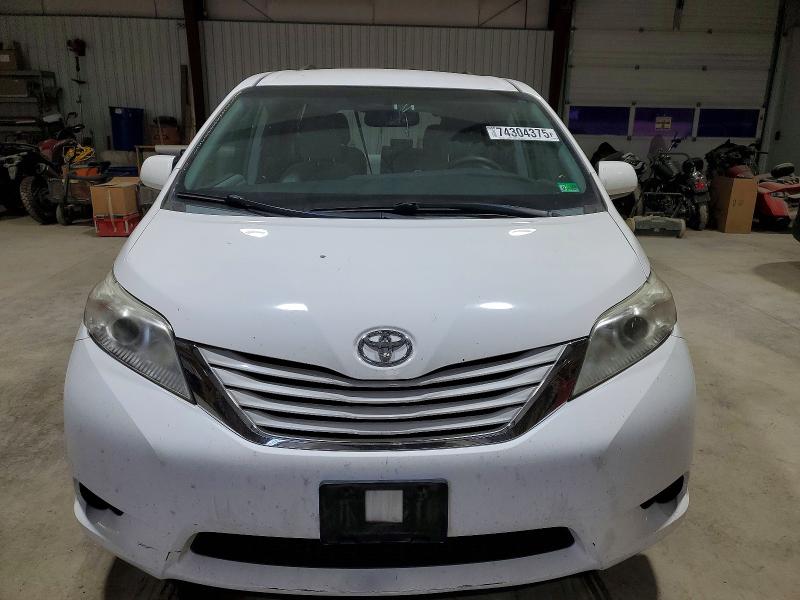Photo 5 from auction – 2015 TOYOTA SIENNA LE with VIN 5TDJK3DC0FS115529