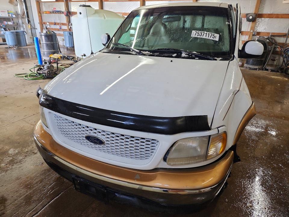 Photo 5 from auction – 1999 FORD F150 with VIN 1FTRX17L8XNB30873