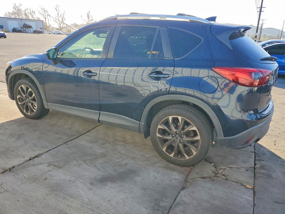 Photo 2 from auction – 2016 MAZDA CX-5 with VIN JM3KE2DY9G0678043