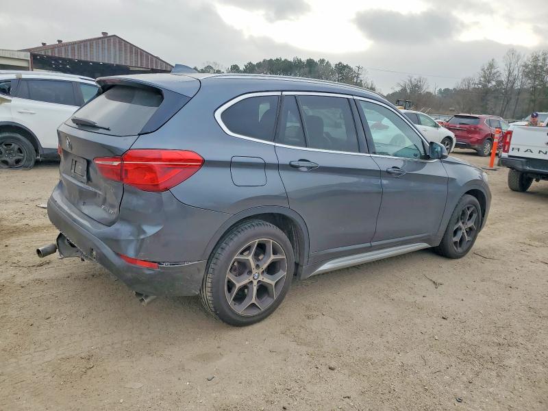 Photo 3 from auction – 2018 BMW X1 with VIN WBXHU7C36J3H43788
