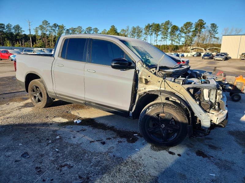 Photo 4 from auction – 2022 HONDA RIDGELINE with VIN 5FPYK3F89NB032697