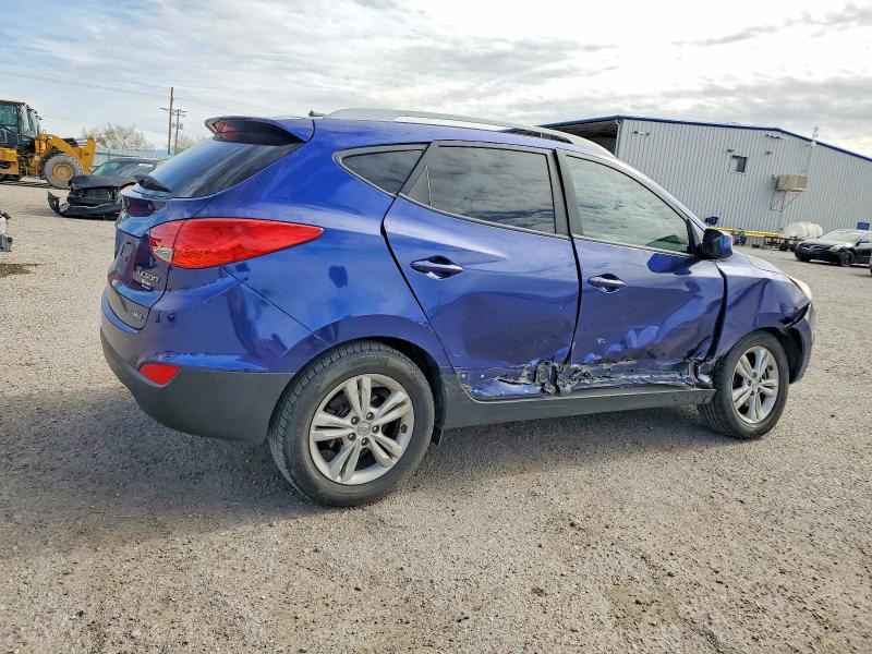 Photo 3 from auction – 2011 HYUNDAI TUCSON with VIN KM8JUCAC0BU191428
