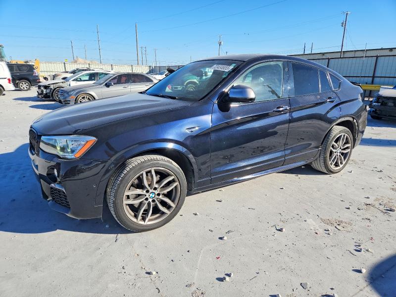 BMW X4 2018 with VIN 5UXXW7C57J0W64972 - Photo from auction