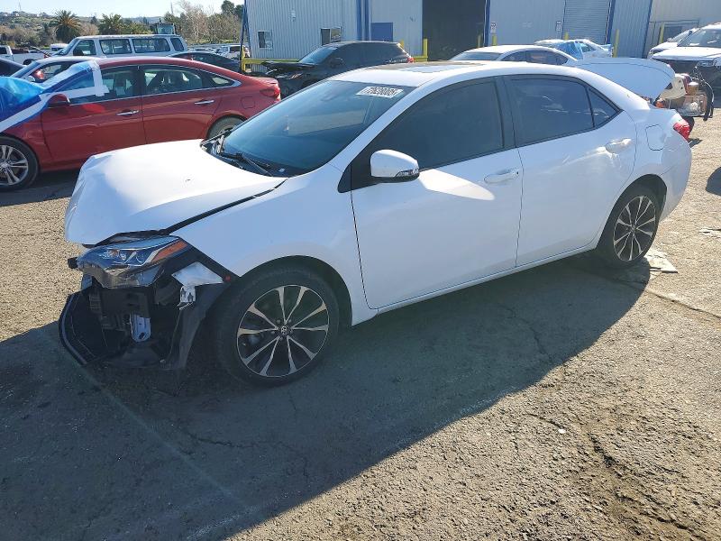 TOYOTA COROLLA L 2018 with VIN 2T1BURHE9JC120131 - Photo from auction