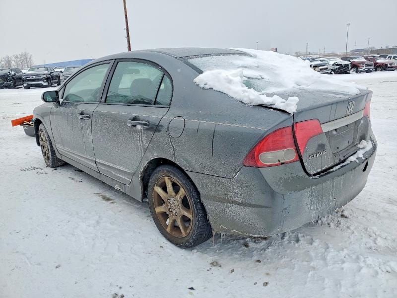 Photo 2 from auction – 2010 HONDA CIVIC EX with VIN 19XFA1F8XAE039567
