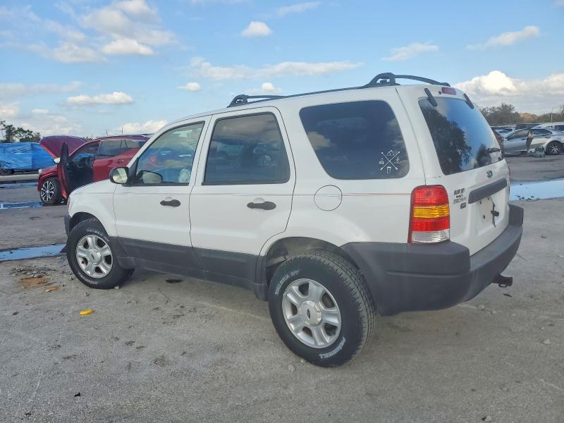 Photo 2 from auction – 2003 FORD ESCAPE XLT with VIN 1FMYU03133KC86426