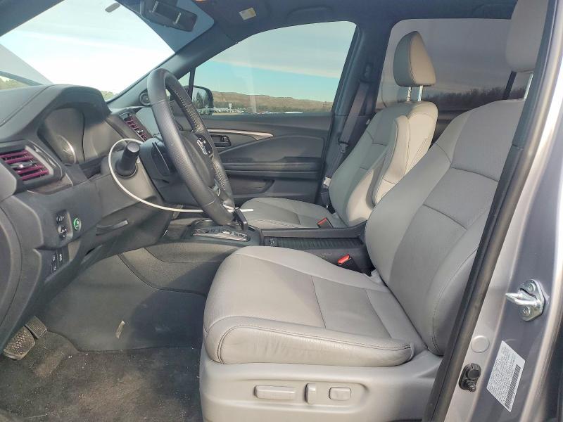 Photo 7 from auction – 2022 HONDA PASSPORT E with VIN 5FNYF8H52NB019304
