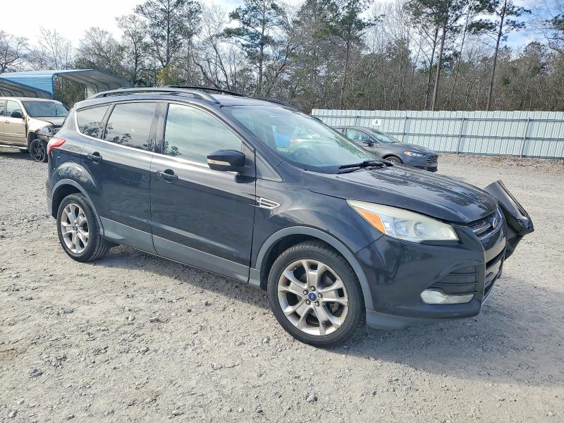 Photo 4 from auction – 2013 FORD ESCAPE with VIN 1FMCU0HX4DUB09140