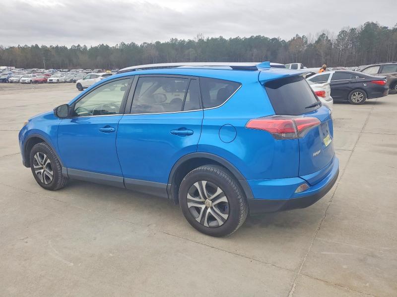 Photo 2 from auction – 2016 TOYOTA RAV4 LE with VIN JTMZFREVXGJ081625